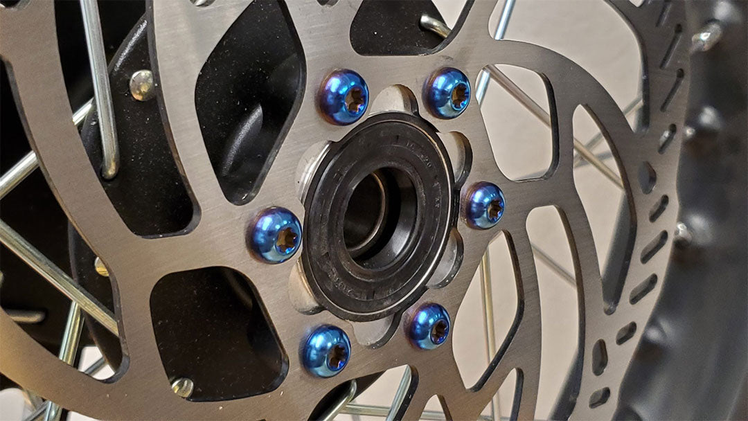 Warp 9 Titanium Rotor Bolts for Sur-Ron, Talaria, E Ride Pro, Rawrr, and 79 Bike electric motorbikes.
